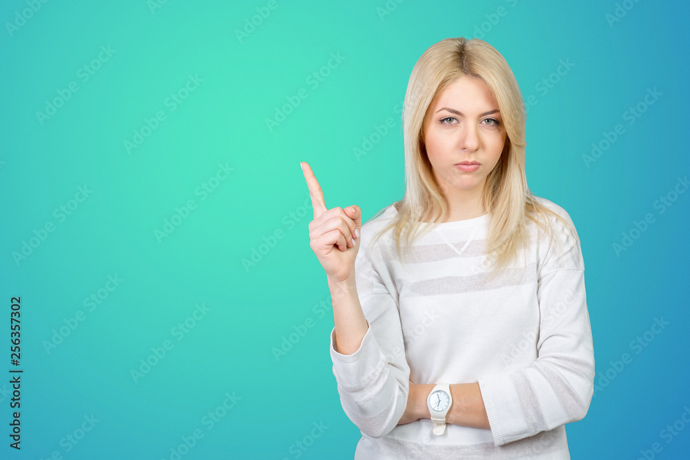 A very annoyed woman point her finger A very annoyed woman point her finger