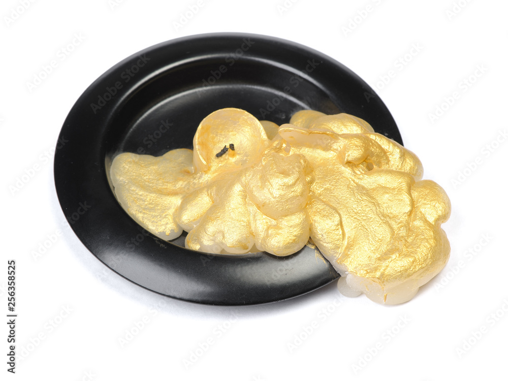 Old golden wax candle Old golden wax candle