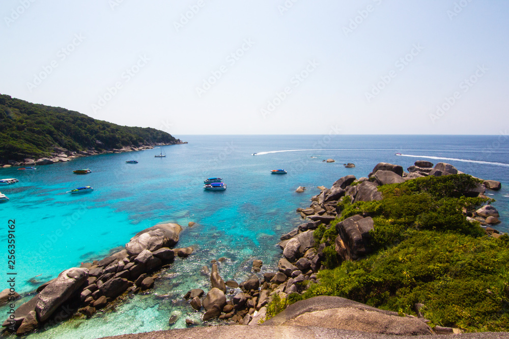 Top view Similan Islands as a tourist destination featured in the beauty under the sea the boat to take tourists snorkeling around the island.