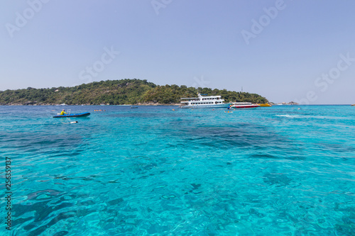 Similan Islands as a tourist destination featured in the beauty under the sea.   the boat to take tourists snorkeling around the island. © piyaphunjun