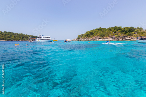 Similan Islands as a tourist destination featured in the beauty under the sea. the boat to take tourists snorkeling around the island.