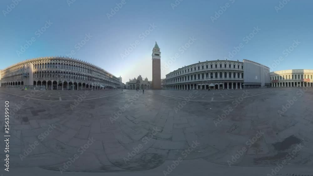 360 VR video. Scene of St. Marks square in early morning. View with Basilica and Campanile. Few people walking and workers cleaning the square