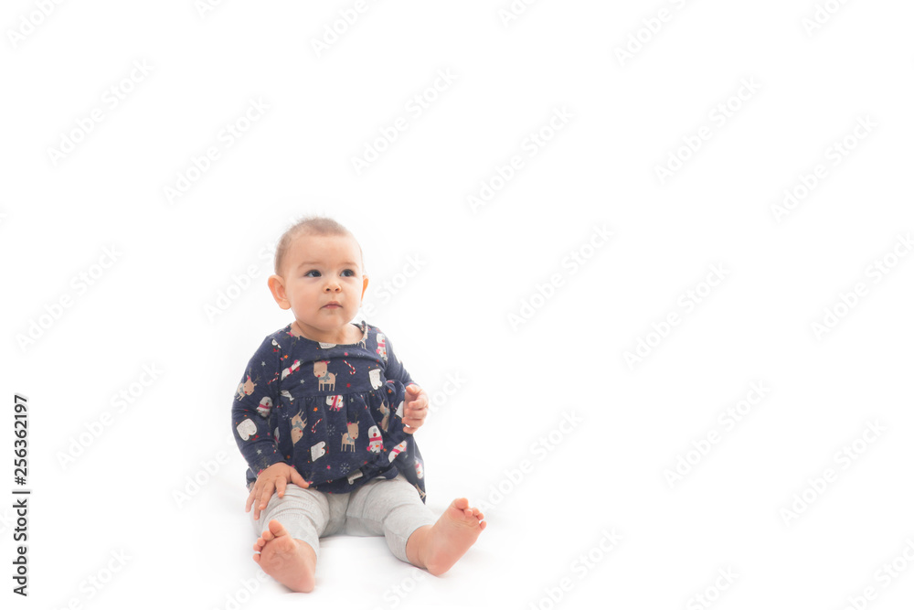 Portrait of a smilling baby girl smiling isolated on a white background childhood Portrait of a smilling baby girl smiling isolated on a white background childhood
