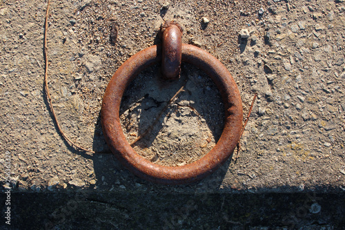 Mooring ring on a port (Arzon - Brittany - France) photo