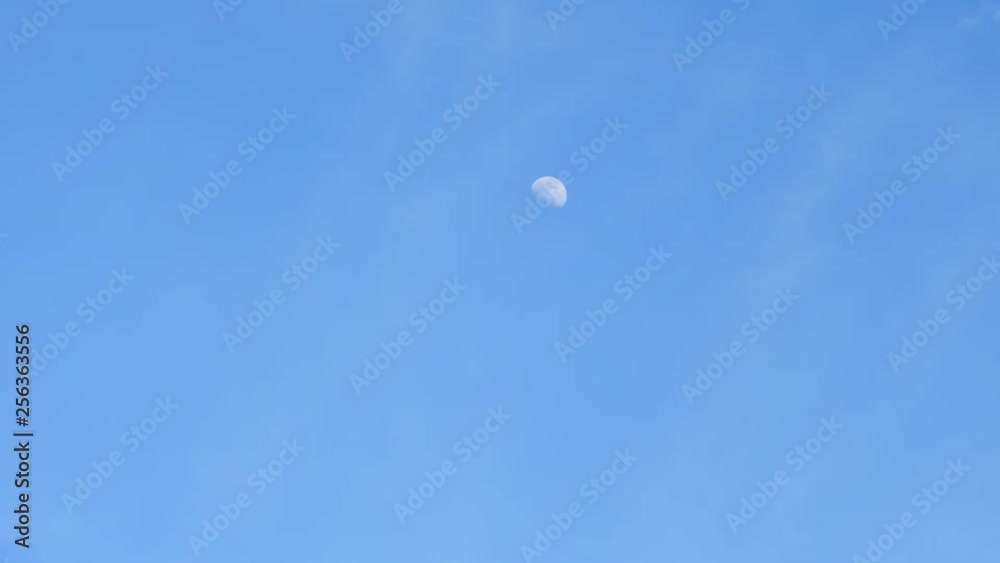 Moon passing by, beautiful time lapse capturing clouds and moon moving Moon passing by, beautiful time lapse capturing clouds and moon moving