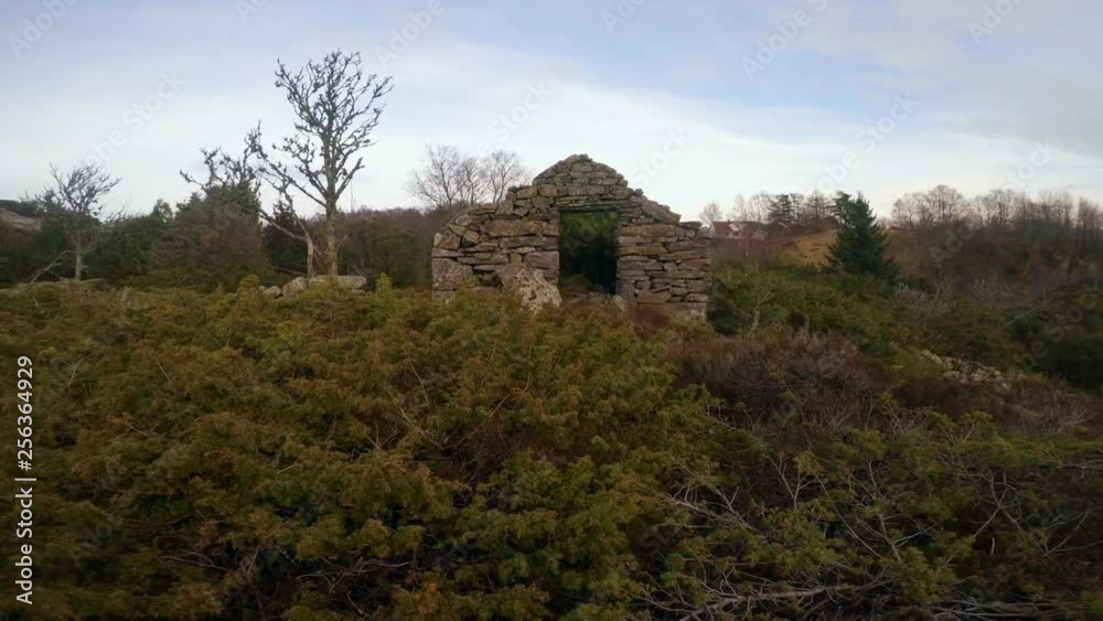 An old cabin or house in the norwegian mountain. The cabin is made of stone, and is abandoned. Its an old wreck. An old cabin or house in the norwegian mountain. The cabin is made of stone, and is abandoned. Its an old wreck.