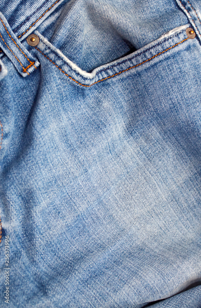 Texture of blue jeans textile close up Texture of blue jeans textile close up