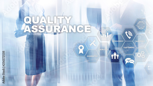 Fototapeta Naklejka Na Ścianę i Meble -  The Concept of Quality Assurance and Impact on Businesses. Quality control. Service Guarantee. Mixed media.