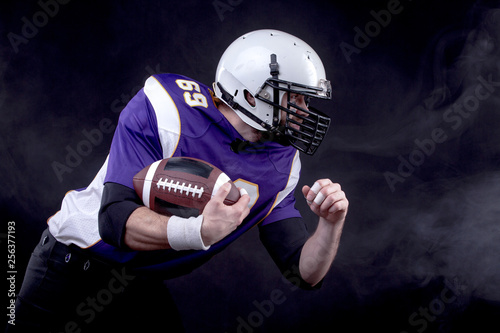 American Footballer in action photo