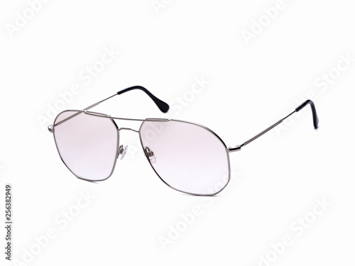 Sunglasses with translucent glasses on an isolated white background.