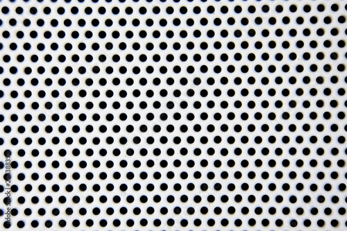 White hole steel pattern background.