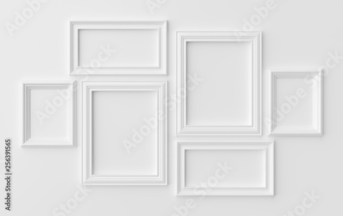 Fototapeta Naklejka Na Ścianę i Meble -  White photoframes on white wall with shadows