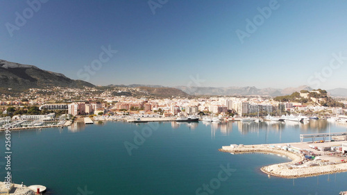 Aerial view of Denia port. The city and Montgo mountain in the background.