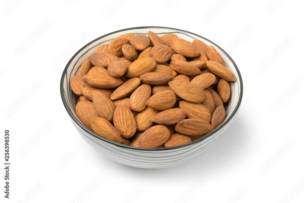 Bowl with peeled almonds close up Bowl with peeled almonds close up