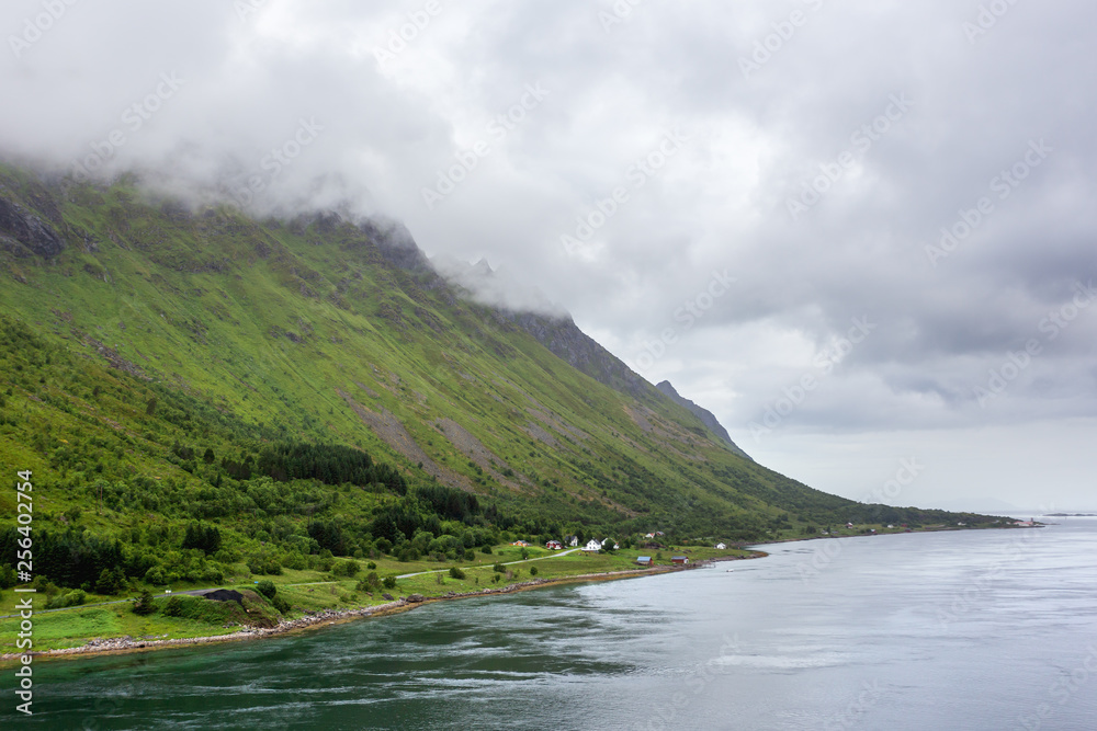 Beautiful scandinavian landscape with meadows, mountains and fjords. Lofoten islands, Norway. Beautiful scandinavian landscape with meadows, mountains and fjords. Lofoten islands, Norway.