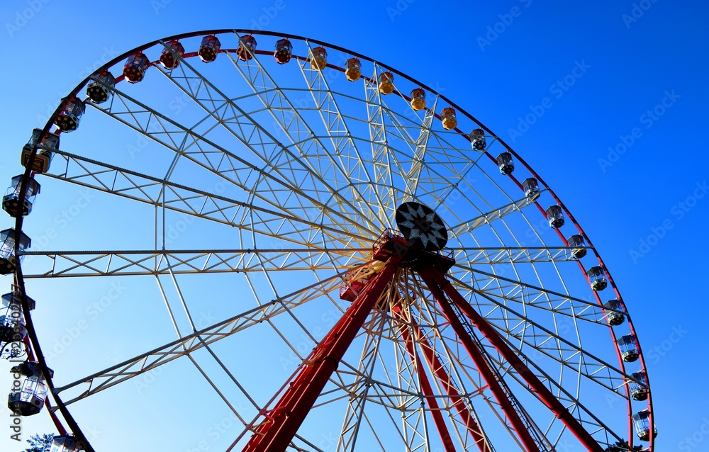 Ferris wheel in a recreation park Ferris wheel in a recreation park