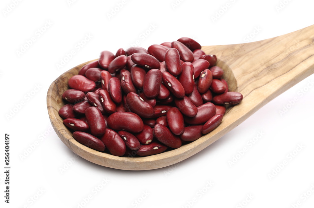 Raw red beans with wooden spoon isolated on white background Raw red beans with wooden spoon isolated on white background
