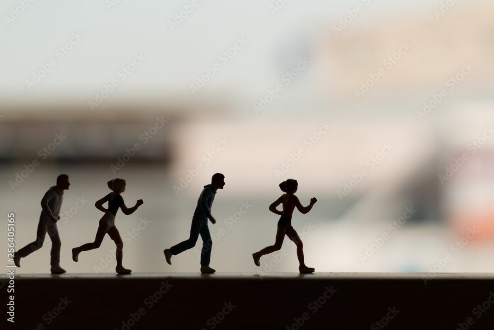 Miniature people: Silhouette of a runner , Health And lifestyle concepts. Miniature people: Silhouette of a runner , Health And lifestyle concepts.