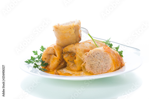 Stuffed cabbage leaves with minced meat and rice in tomato sauce.