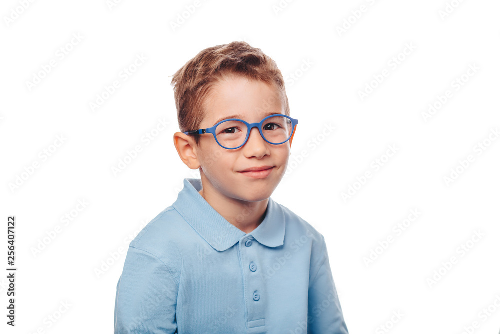 cucasian boy wearing eyeglasses and looking at camera over white background. Concept new eyeglasses for good vision cucasian boy wearing eyeglasses and looking at camera over white background. Concept new eyeglasses for good vision