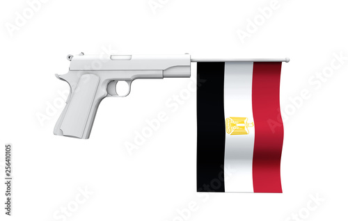 Egypt gun control concept. Hand gun with national flag photo