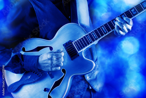 Canvas Print playing jazz guitar on stage