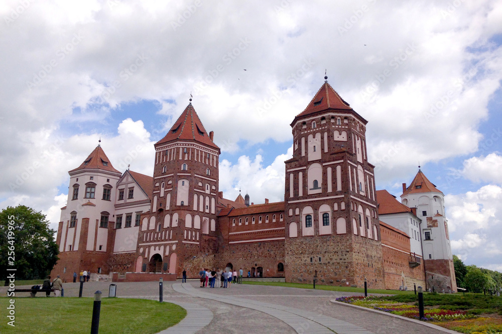 Mir Castle on the background of blue sky with clouds summer day, Belarus
