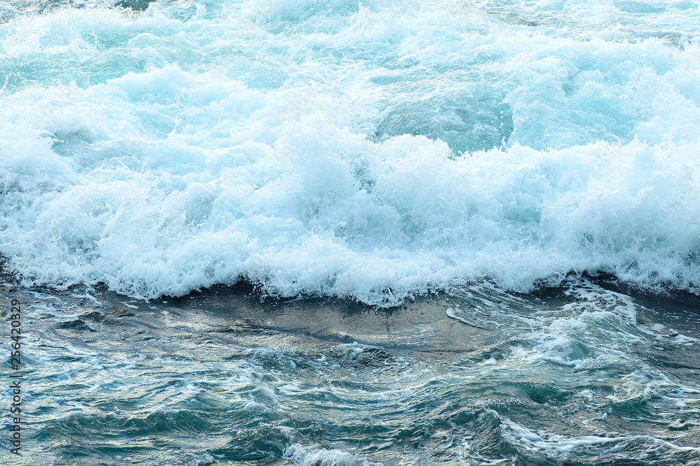 Sea water with foam. Top view sea texture. Nature wallpaper. Ocean waves, water from top view, pattern background ocean.