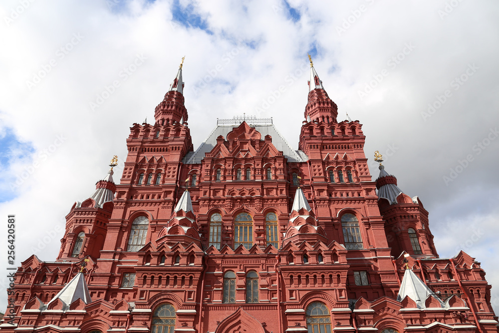 Building of the State historical museum on Red square in Moscow against blue sky with white clouds. Russian architecture landmark