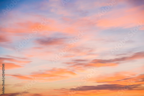 Stunning sunset sky and orange clouds background.