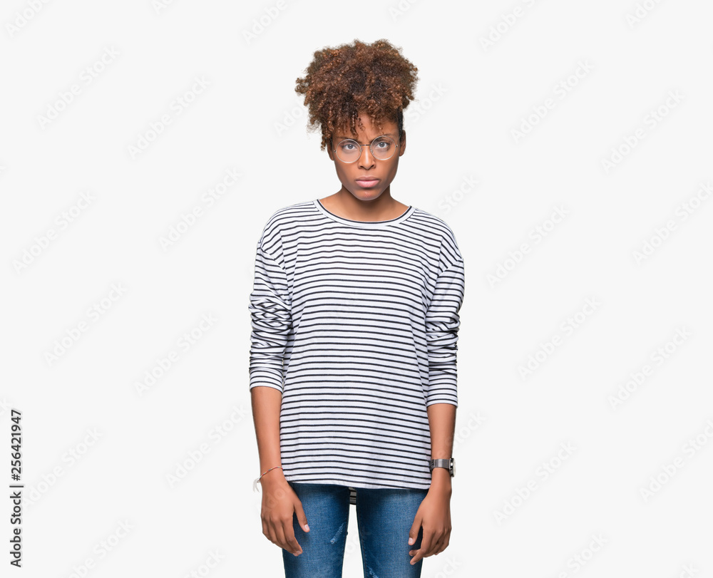 Beautiful young african american woman wearing glasses over isolated background skeptic and nervous, frowning upset because of problem. Negative person. Beautiful young african american woman wearing glasses over isolated background skeptic and nervous, frowning upset because of problem. Negative person.