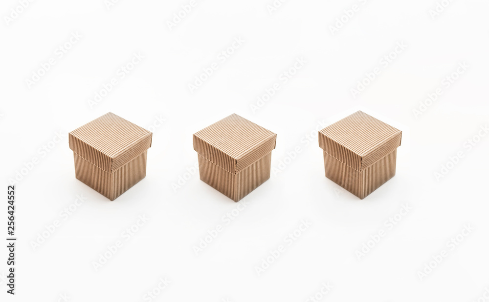 Obraz premium Three isolated cardboard boxes on white background