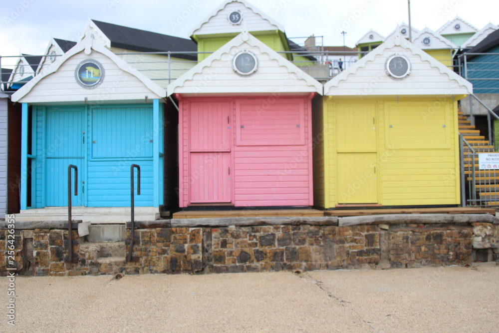 Beach huts at Walton on the Naze, Beach Huts, Essex, England, beach huts are traditional seaside feature for people to change or base themselves. Walton-on-naze, Essex, UK Beach huts at Walton on the Naze, Beach Huts, Essex, England, beach huts are traditional seaside feature for people to change or base themselves. Walton-on-naze, Essex, UK