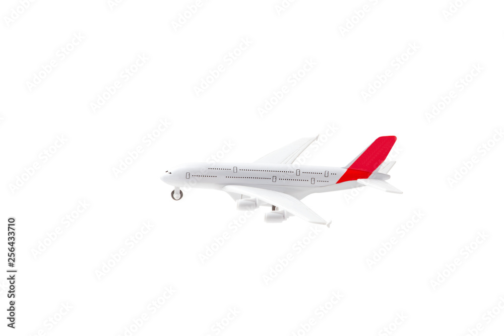 Isolated toy model of an airplane. Travel and air transport concept