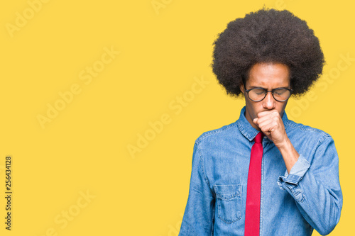 Young african american business man with afro hair wearing glasses and red tie feeling unwell and coughing as symptom for cold or bronchitis. Healthcare concept. © Krakenimages.com