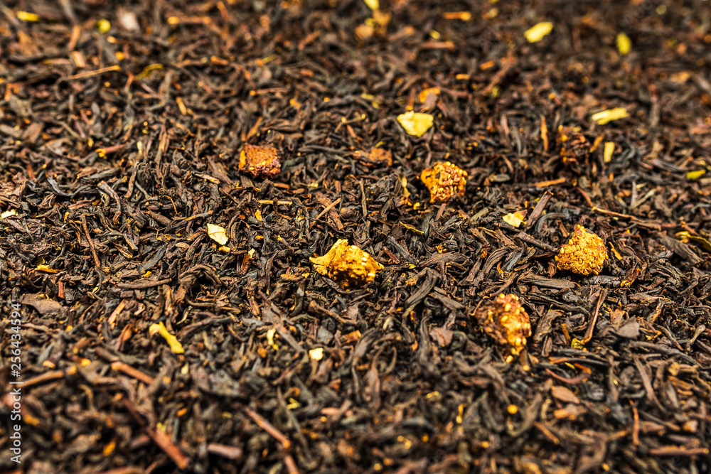 Dry black tea leaves with dried fruits Dry black tea leaves with dried fruits