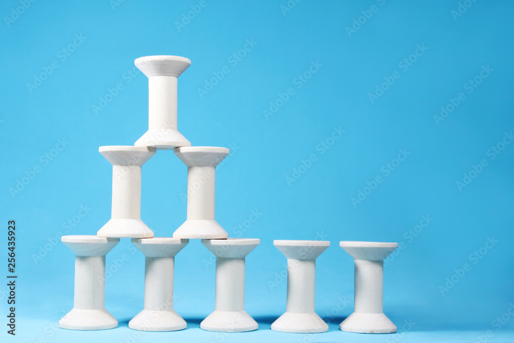 Empty wooden spools of thread. Empty wooden spools of thread.