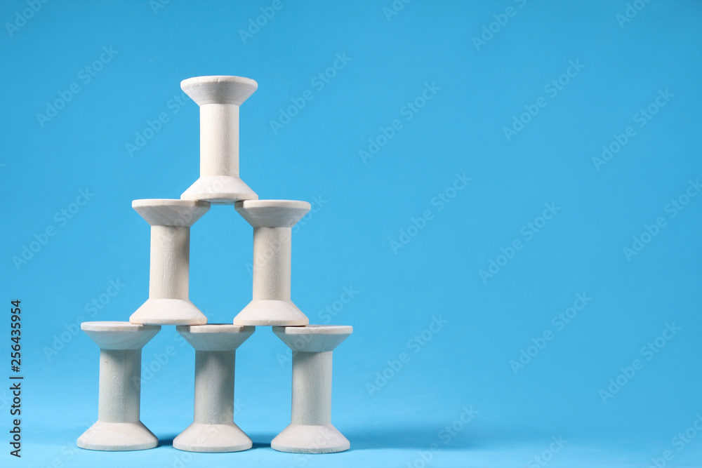 Empty wooden spools of thread. Empty wooden spools of thread.
