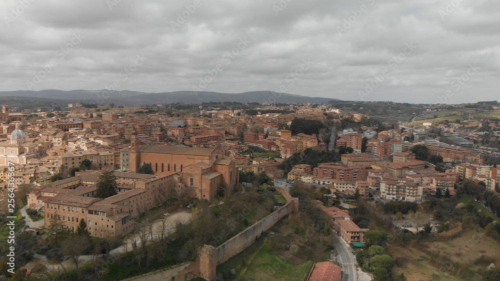 Siena, Tuscany. Beautiful aerial city skyline from surrounding hills