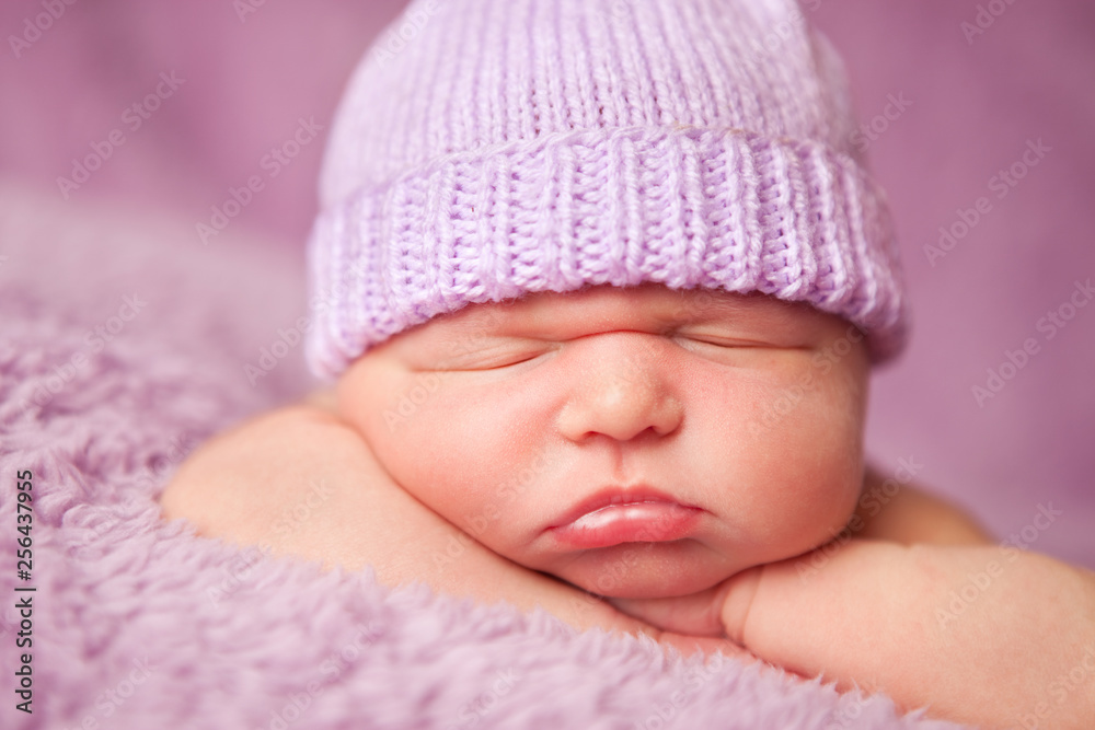 Newborn Baby Girl Sleeping Peacefully in Knit Hat - Infant Portrait Newborn Baby Girl Sleeping Peacefully in Knit Hat - Infant Portrait
