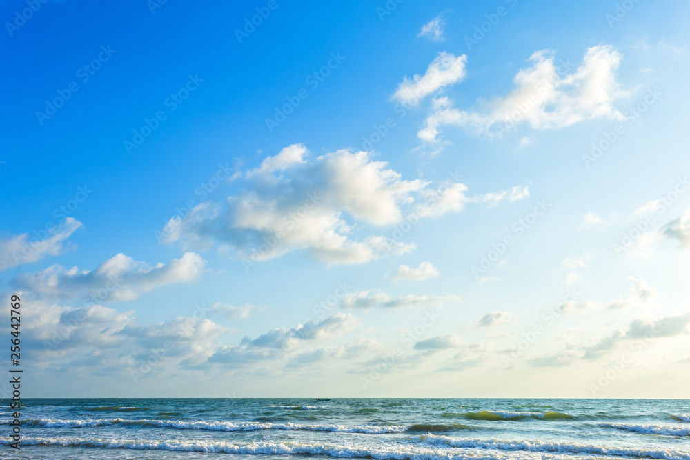 Beautiful early morning sunrise over the sea the horizon,blue sky background texture with white clouds sunset. Beautiful early morning sunrise over the sea the horizon,blue sky background texture with white clouds sunset.