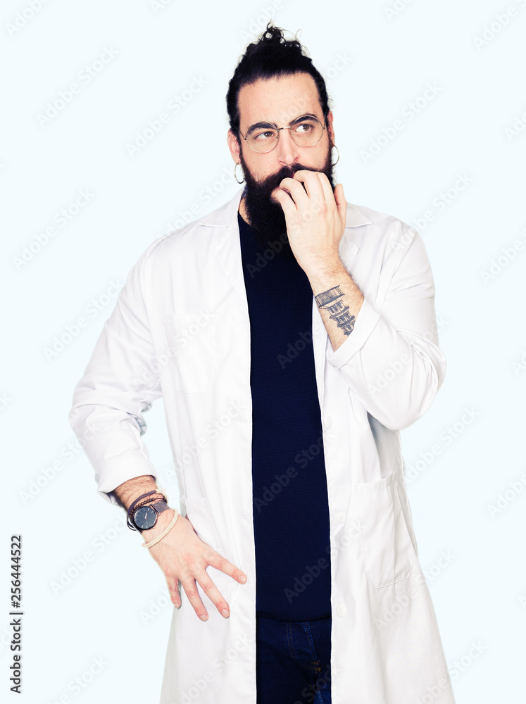 Doctor therapist man with long hair and bear wearing white coat looking stressed and nervous with hands on mouth biting nails. Anxiety problem. Doctor therapist man with long hair and bear wearing white coat looking stressed and nervous with hands on mouth biting nails. Anxiety problem.