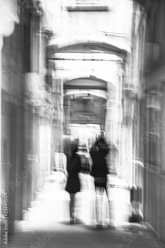 Venice Italy - Tourist couple exploring Venice streets. Blurred picture.
