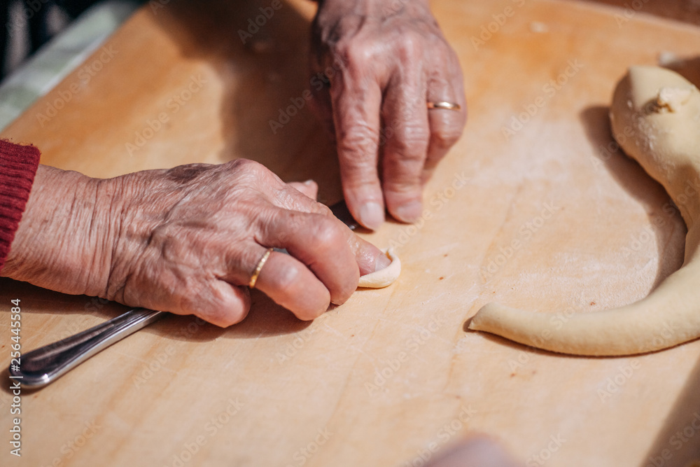 The making of Italian traditional Orecchiette pasta The making of Italian traditional Orecchiette pasta
