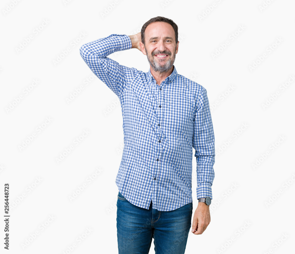 Handsome middle age elegant senior man over isolated background Smiling confident touching hair with hand up gesture, posing attractive Handsome middle age elegant senior man over isolated background Smiling confident touching hair with hand up gesture, posing attractive