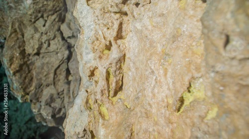 There is yellow surface on a dripstone in a cave. Cave Pekel in the middle of Slovenia. photo