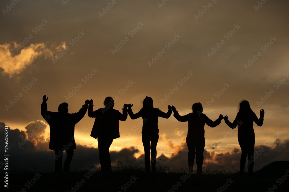 group of happy young people dancing at the beach on beautiful summer sunset .savsat/artvin/turkey group of happy young people dancing at the beach on beautiful summer sunset .savsat/artvin/turkey