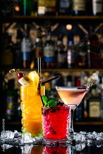 beautiful bright cocktails on the bar in the nightclub