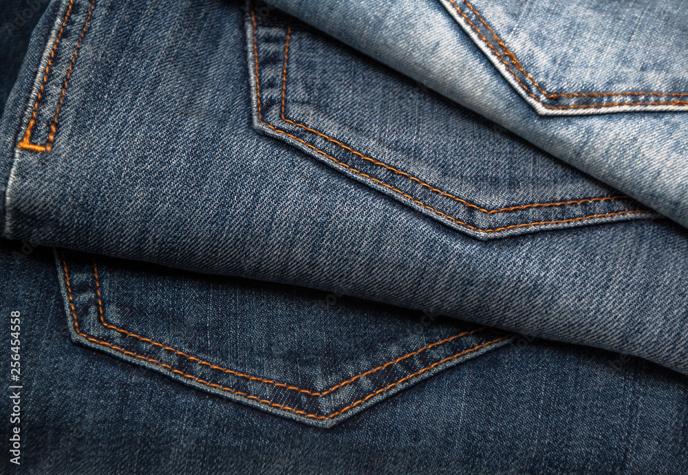 Beauty and fashion, clothing concept - stack of jeans