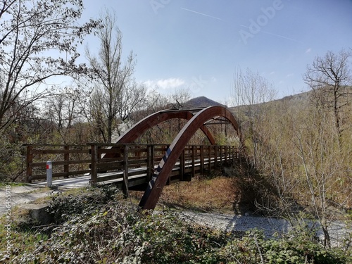 old wooden bridge over the river © Nedeljko